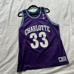 Vintage 90’s Champion Charlotte Hornets Alonso Mourning Jersey #33 in Purple